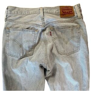 Levi's 501 Light Blue Denim Jeans. Button fly. Rips. Size 27. Leg 28. Like new